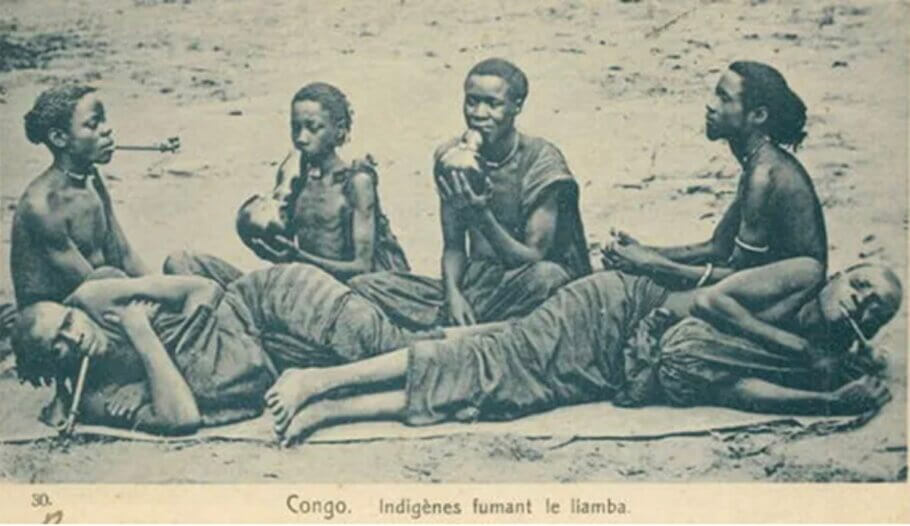 'Indigenes fumant le Liamba' (Indigenous people smoking cannabis). Postcard from Congo, Africa, pre-1919