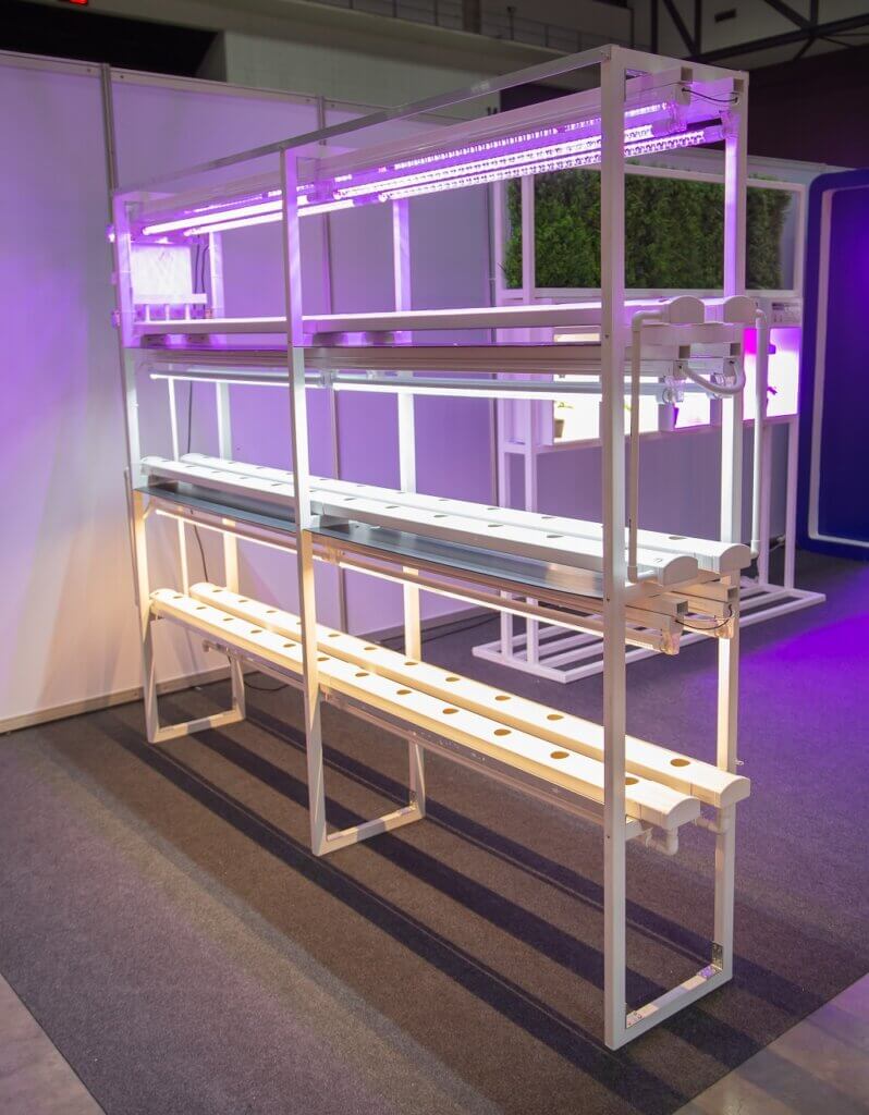Three-tier vertical grow rack for hydroponic cultivation
