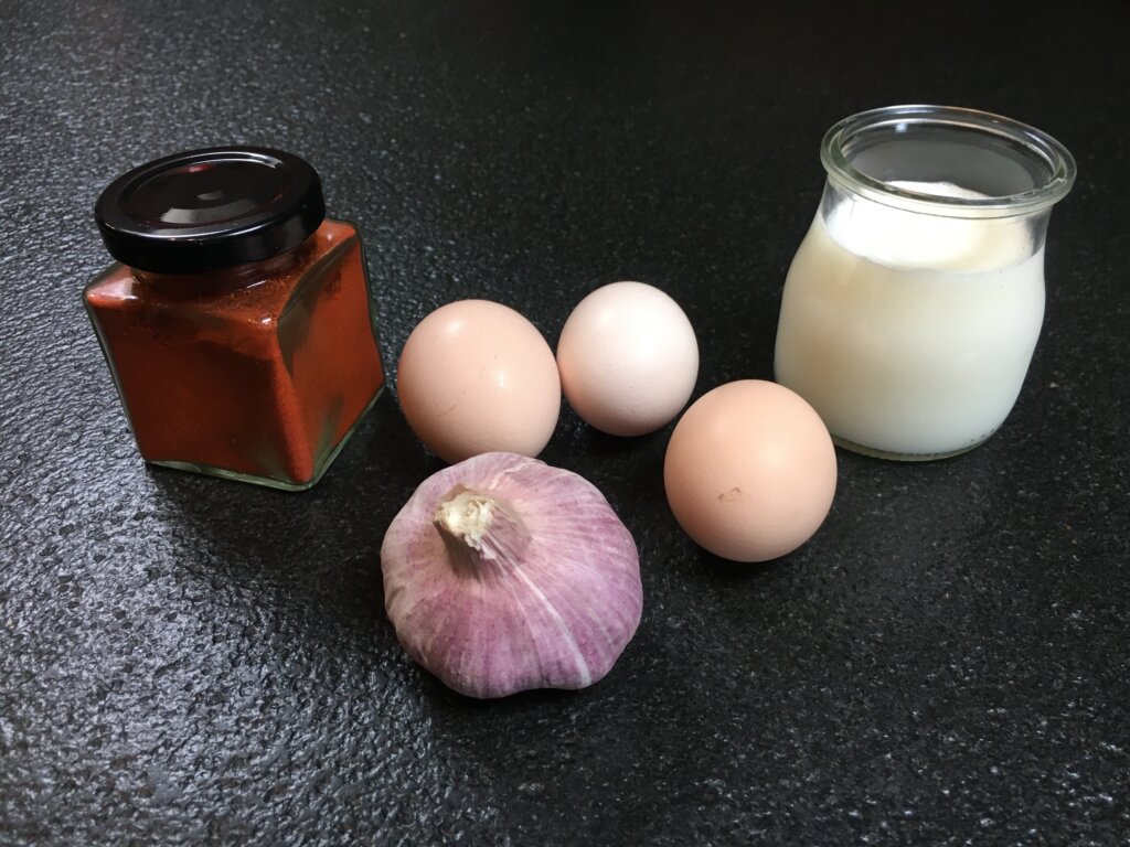 Ingredients for a DIY animal repellent: Chilli powder, garlic, eggs and milk