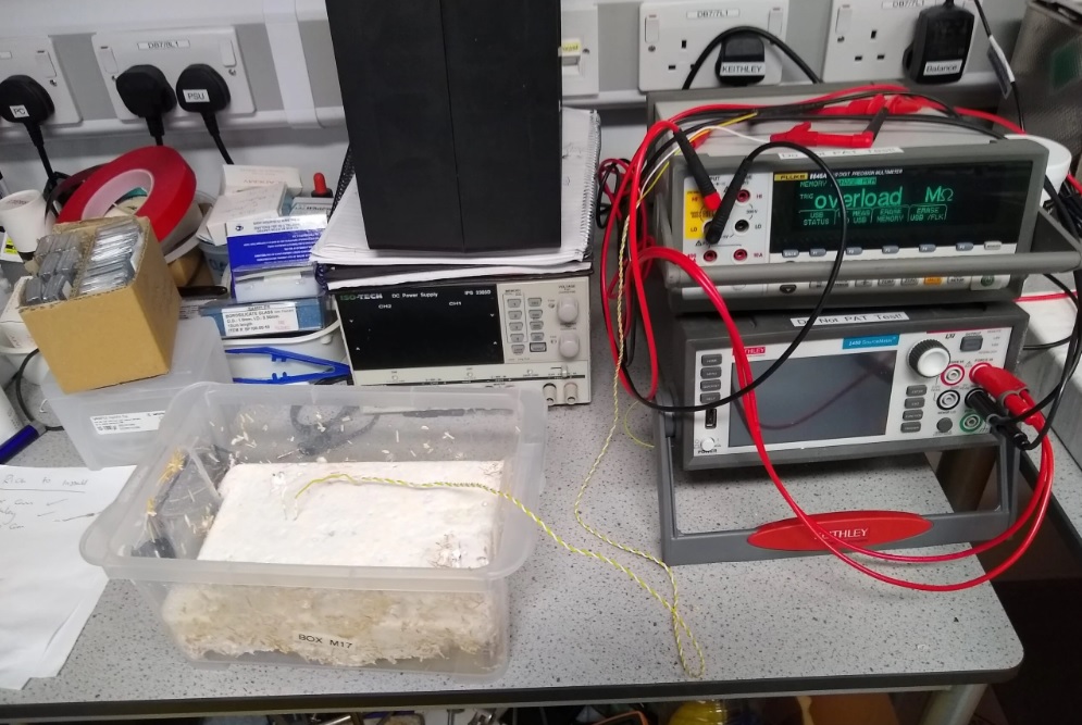Preparation to record the dynamics of electrical resistance of hemp shavings colonized by oyster mushrooms (Image: Andrew Adamatzky)